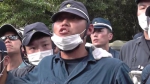日本警察辱骂冲绳民众：闭嘴！支那人！（视频截图） - News.Sina.com.Cn