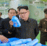 2016年10月29日讯（具体拍摄时间不详），朝鲜最高领导人金正恩视察新建的龙月山肥皂厂，现场指导工作笑容满面。来源：视觉中国 - News.Sina.com.Cn