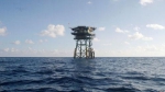 1越南在南沙群岛上的浮动看守站。（图片来源：美国之音电台网站） - News.Sina.com.Cn