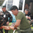 资料图：图为一名受伤的总统保安队成员被空运到一处军营治疗 - News.Sina.com.Cn