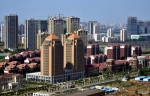 巨量资金导入是楼市局部过热的主要源头。摄影/章轲 - News.Sina.com.Cn