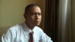 资料图：中国奥巴马模仿者肖基国。 - News.Sina.com.Cn