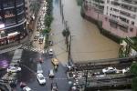基隆市武仑溪暴涨，溪水淹到马路上。 - News.Sina.com.Cn