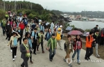 访问济州岛的中国游客。资料图 - News.Sina.com.Cn