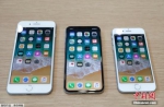 资料图：苹果公司最新发布的三款手机产品。  - News.Sina.com.Cn