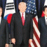 图为2017年7月6日，在德国汉堡美国总领事馆，韩国总统文在寅（左）、美国总统特朗普（中）和日本首相安倍晋三在共进晚餐前合影留念。图片来源：韩联社 - News.Sina.com.Cn