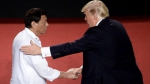 菲律宾总统杜特尔特（左一）与美国总统特朗普（右一）。 - News.Sina.com.Cn