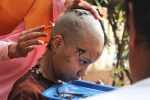 12岁的德差若然在选择成为一名短期尼姑后，剃光了头发。 - News.Sina.com.Cn
