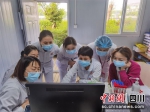 图为成都妇女儿童医院核酸采样队队员在工作中。成都市妇女儿童中心医院供图 - Sc.Chinanews.Com.Cn