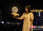 “超级月亮”现身四川古蔺天宇 - Sc.Chinanews.Com.Cn