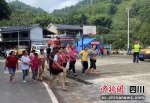 在社区开展应急救援疏散演练。四川应急供图 - Sc.Chinanews.Com.Cn
