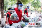“惠民蔬菜包”运抵社区。成都益民集团供图 - Sc.Chinanews.Com.Cn