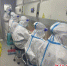 队员在核酸检测实验室忙碌。顺庆区融媒体中心供图 - Sc.Chinanews.Com.Cn