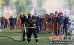 第一届社会消防力量技能竞赛现场。刘忠俊 摄 - Sc.Chinanews.Com.Cn