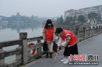 环境保护志愿活动现场。衡欢 摄 - Sc.Chinanews.Com.Cn