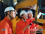 项目经理牵头检查施工质量、安全隐患。中国能建葛洲坝机电公司供图 - Sc.Chinanews.Com.Cn