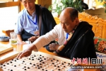 往届藏棋比赛现场。(资料图) - Sc.Chinanews.Com.Cn